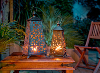 Metal Candle lanterns, with openwork motifs
