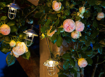 Solar garland in the form of traditional metal lanterns